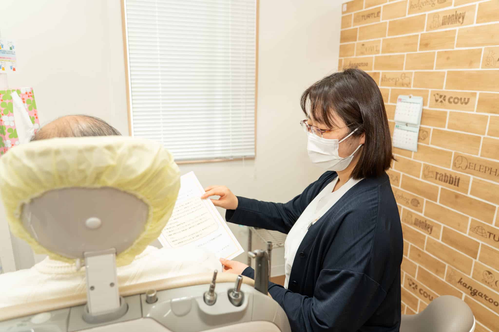 女性院長の診療